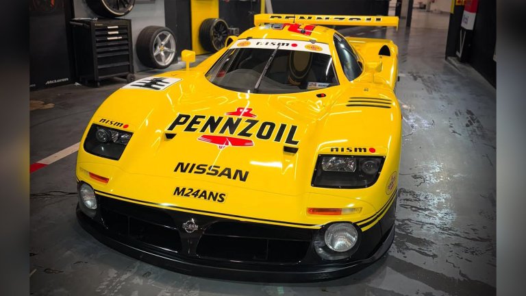 Photo of Erik Comas' Nissan R390 GT1 wrapped in a Pennzoil NISMO GT-R GT500 livery.