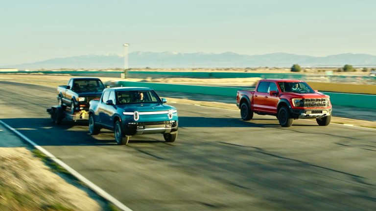Watch a Rivian R1T Towing a Truck Drag Race a Ford F-150 Raptor